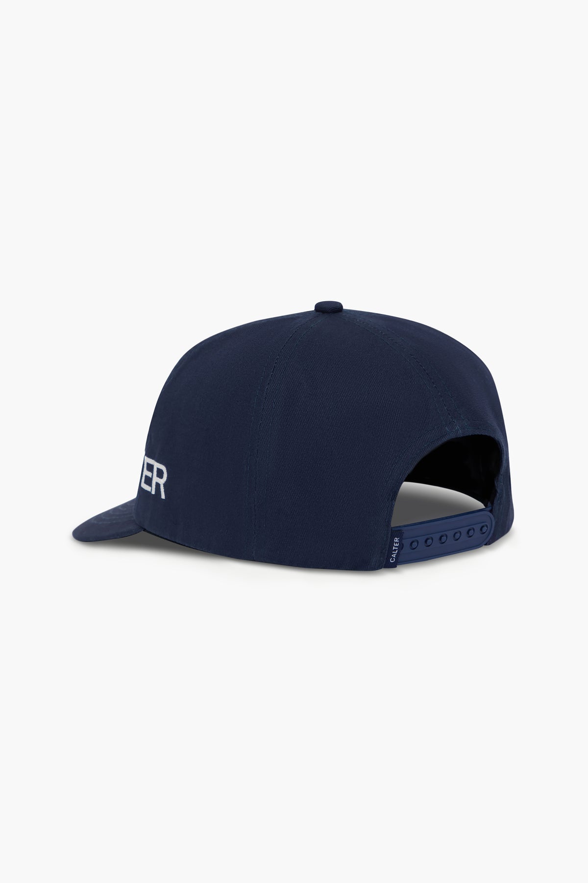 Navy Studio Cap, rear three-quarter view, showing the snapback closure and woven CALTER label.