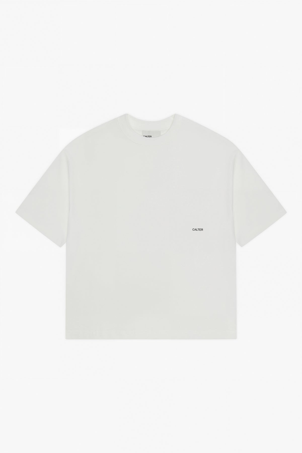 Off-White Stamp Tee, front view, with a black CALTER print at the left chest.