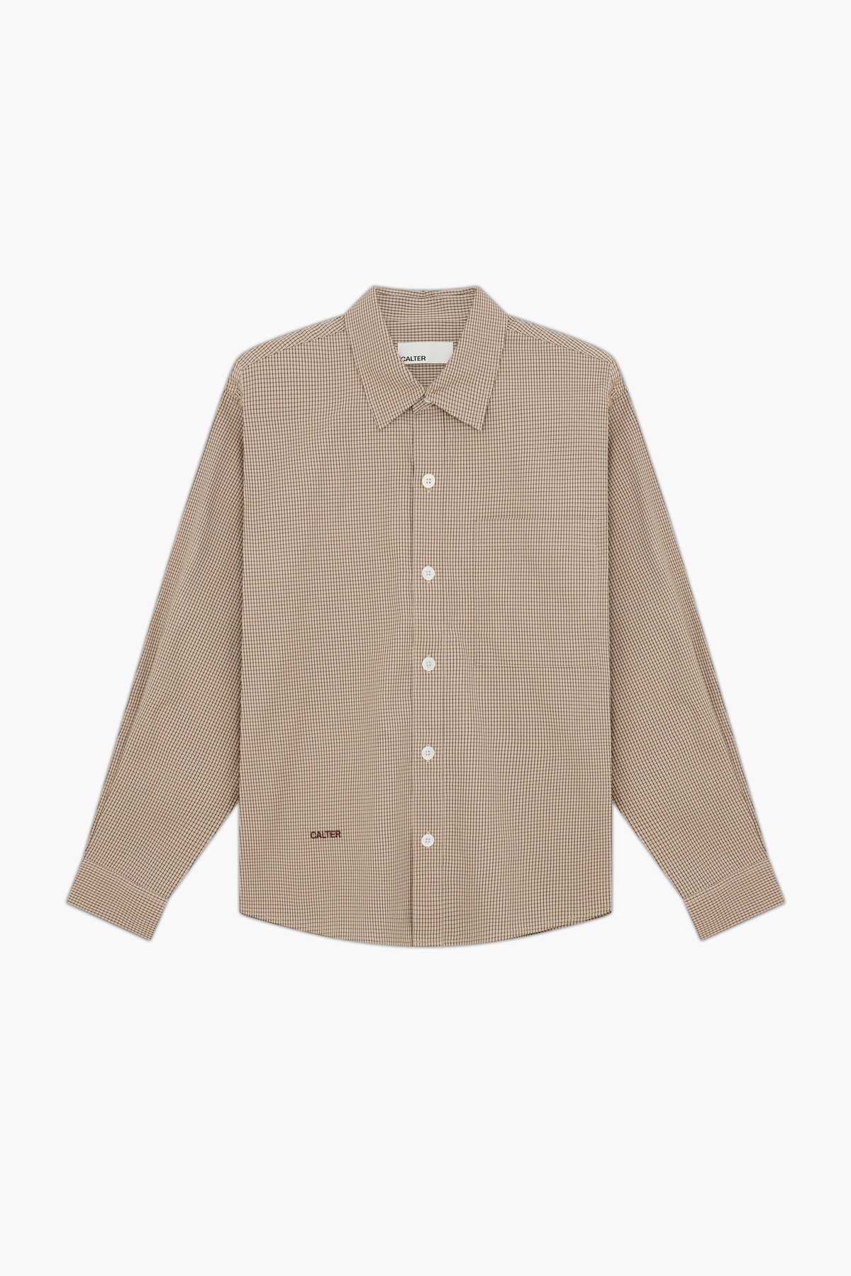 Sand Microcheck Studio Shirt, front view, showing the long sleeves, chest patch pocket and contrast front-hem embroidery.