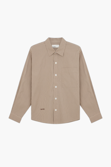 Sand Microcheck Studio Shirt, front view, showing the long sleeves, chest patch pocket and contrast front-hem embroidery.